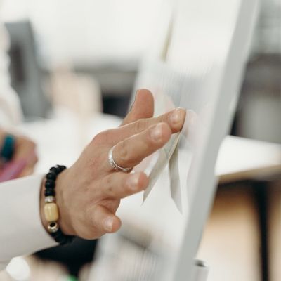 Close-up of hands in a calm, focused gesture.